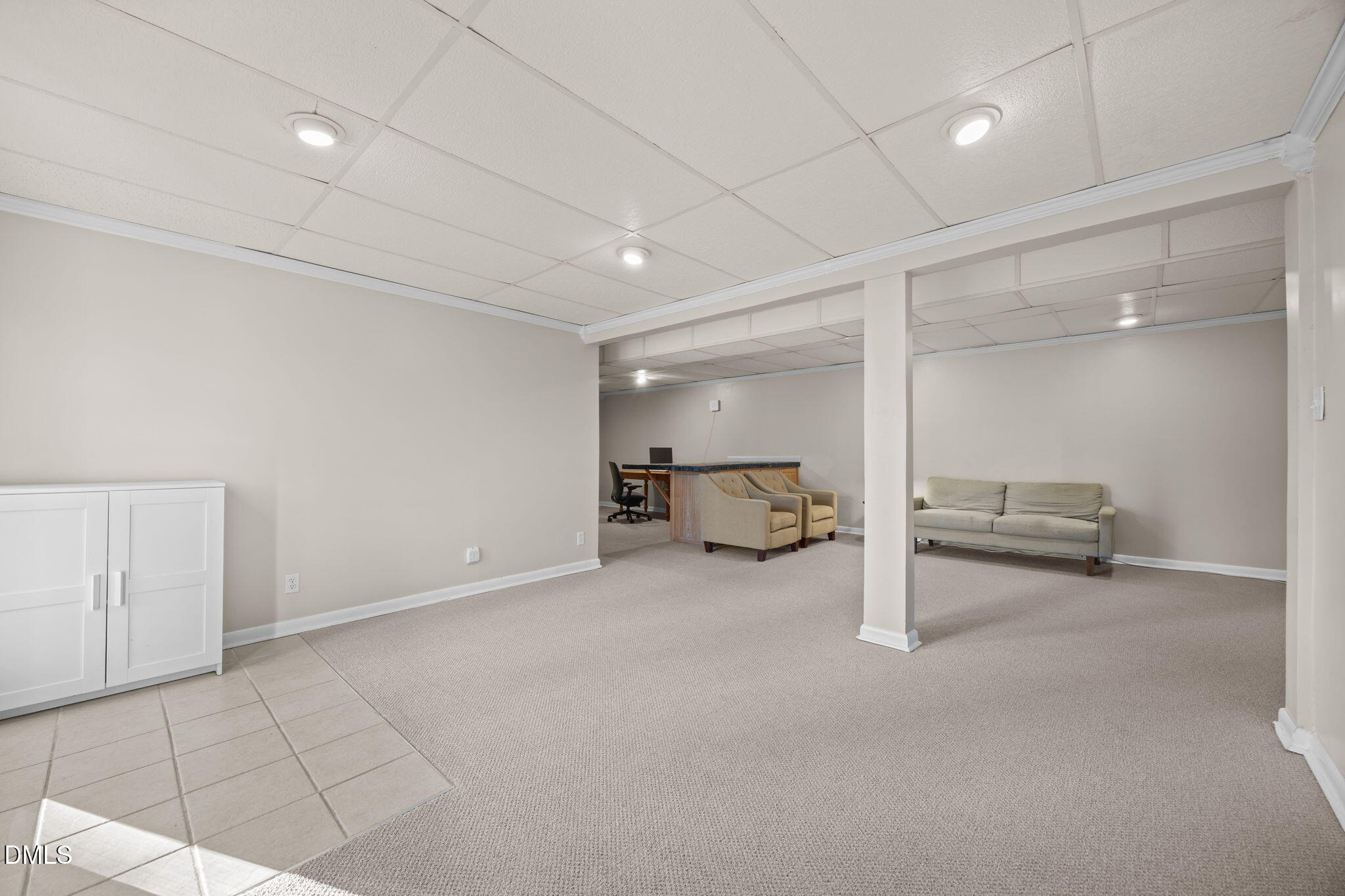 4828 Latimer Road Raleigh, NC 27609 - Photo 24 of 47 a view of a livingroom with a walk in closet and a window