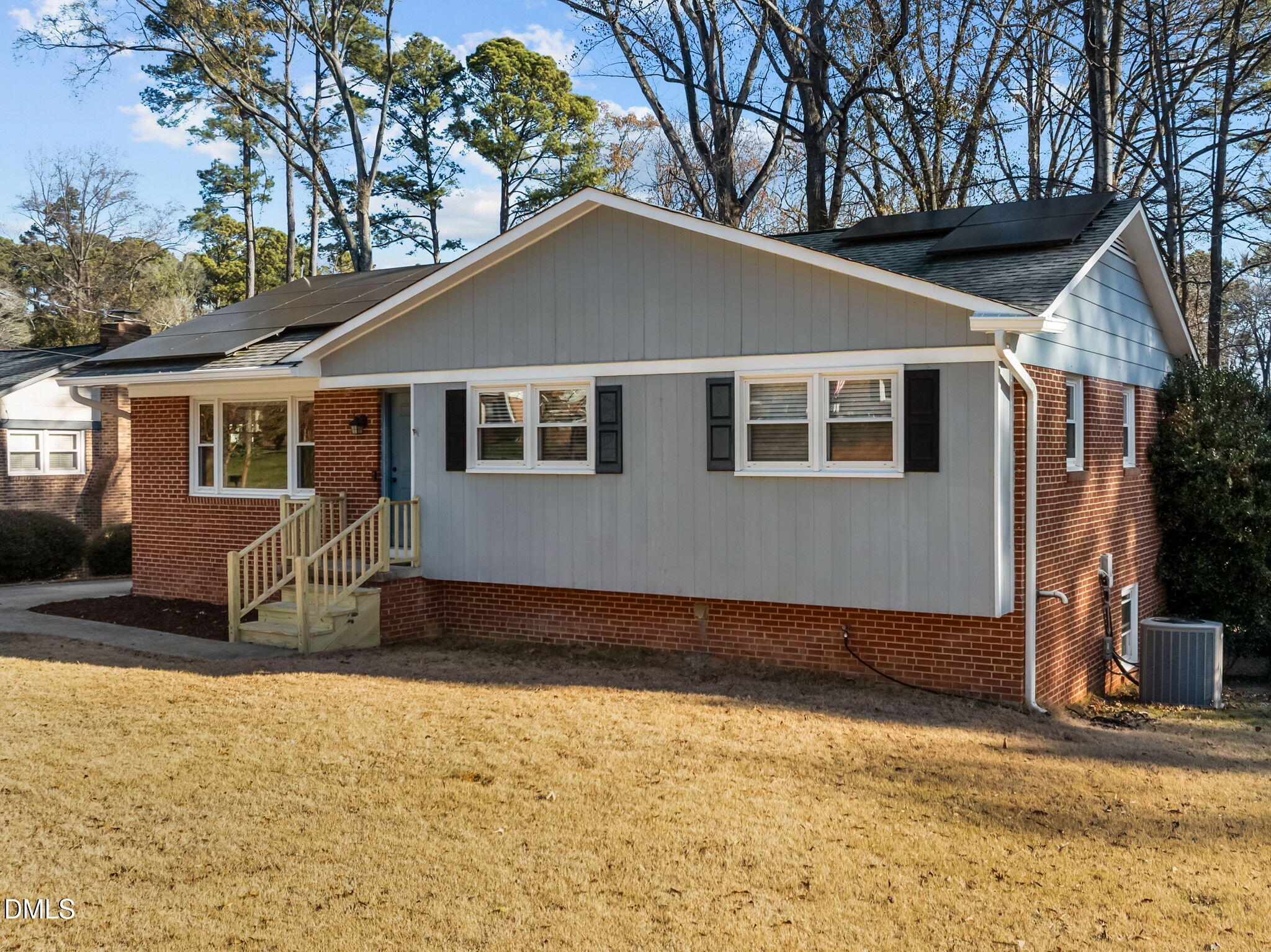 4828 Latimer Road Raleigh, NC 27609 - Photo 2 of 47 a house with trees in the background