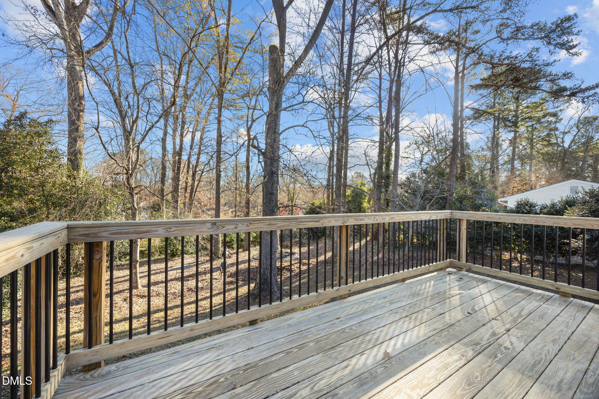 4828 Latimer Road Raleigh, NC 27609 - Photo 31 of 47 a view of balcony with wooden floor and fence