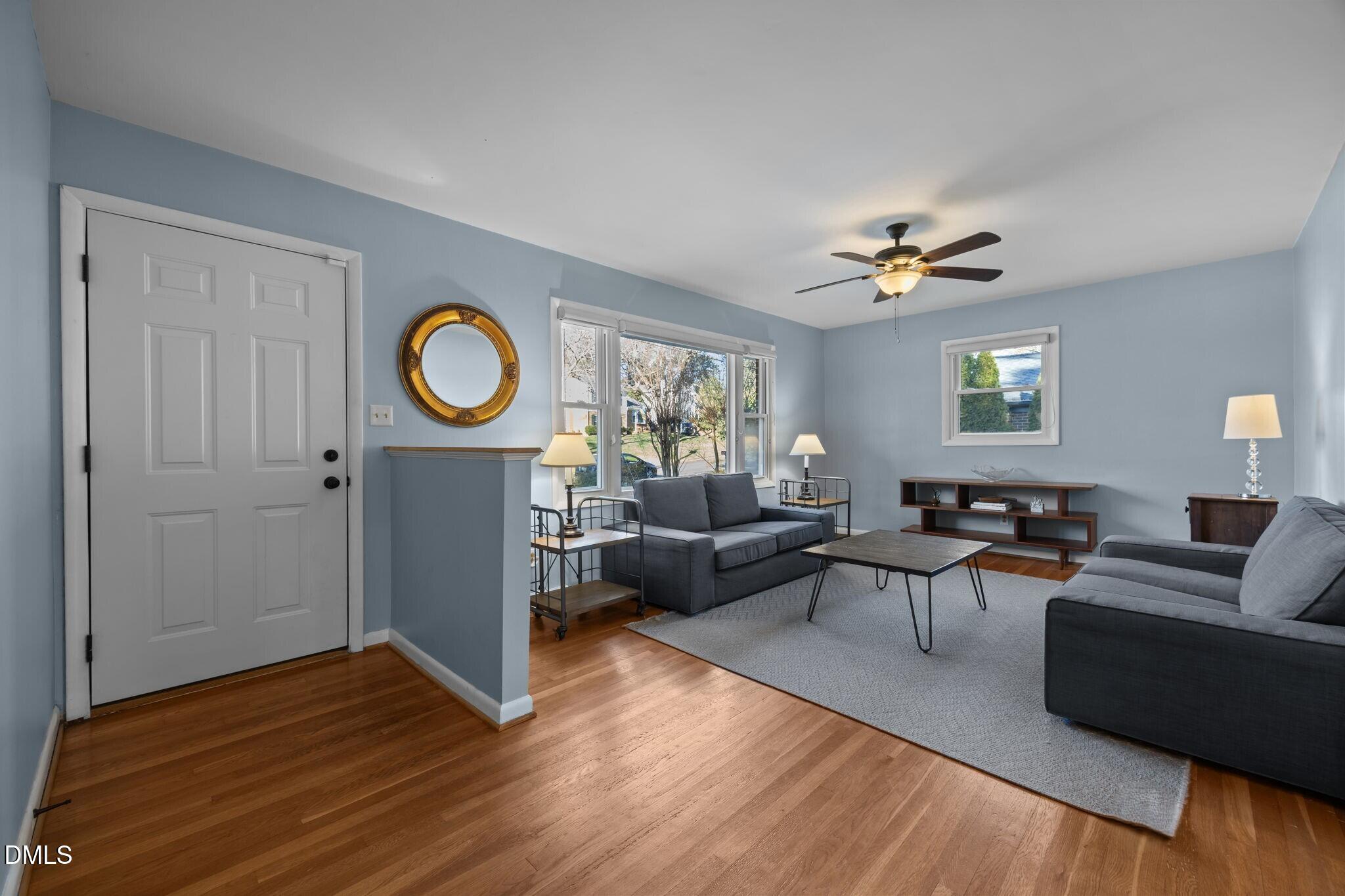 4828 Latimer Road Raleigh, NC 27609 - Photo 3 of 47 a living room with furniture and a window