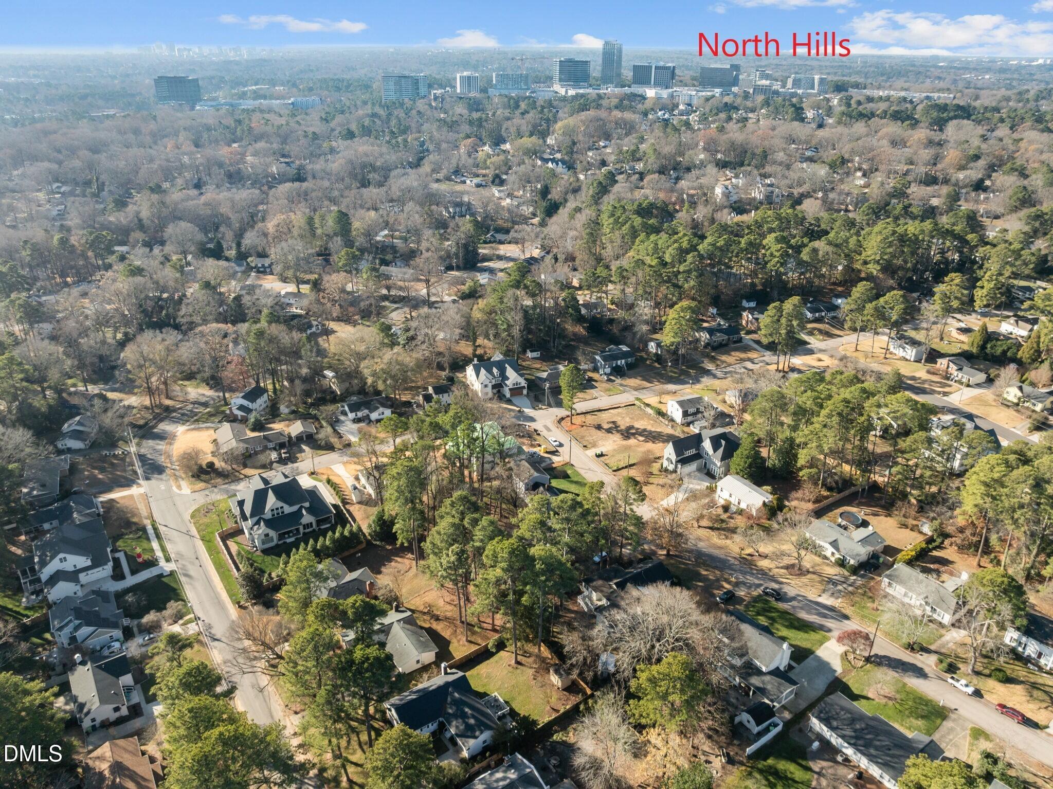 4828 Latimer Road Raleigh, NC 27609 - Photo 41 of 47 an aerial view of a houses with a yard