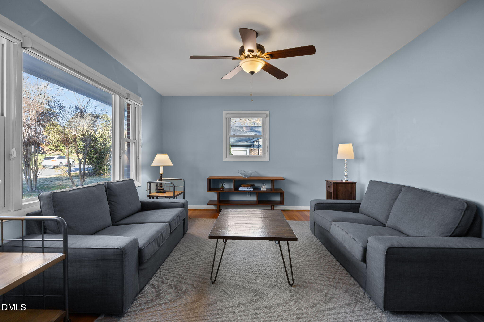 4828 Latimer Road Raleigh, NC 27609 - Photo 4 of 47 a living room with furniture and a large window