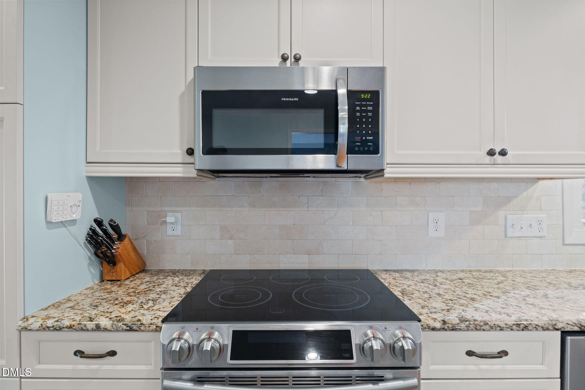 4828 Latimer Road Raleigh, NC 27609 - Photo 8 of 47 a stove top oven sitting inside of a kitchen