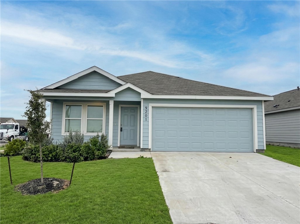 front view of house with a yard
