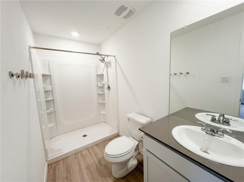 9201 Wilde Way Corpus Christi, TX 78410 - Photo 11 of 21 a bathroom with a sink toilet and shower