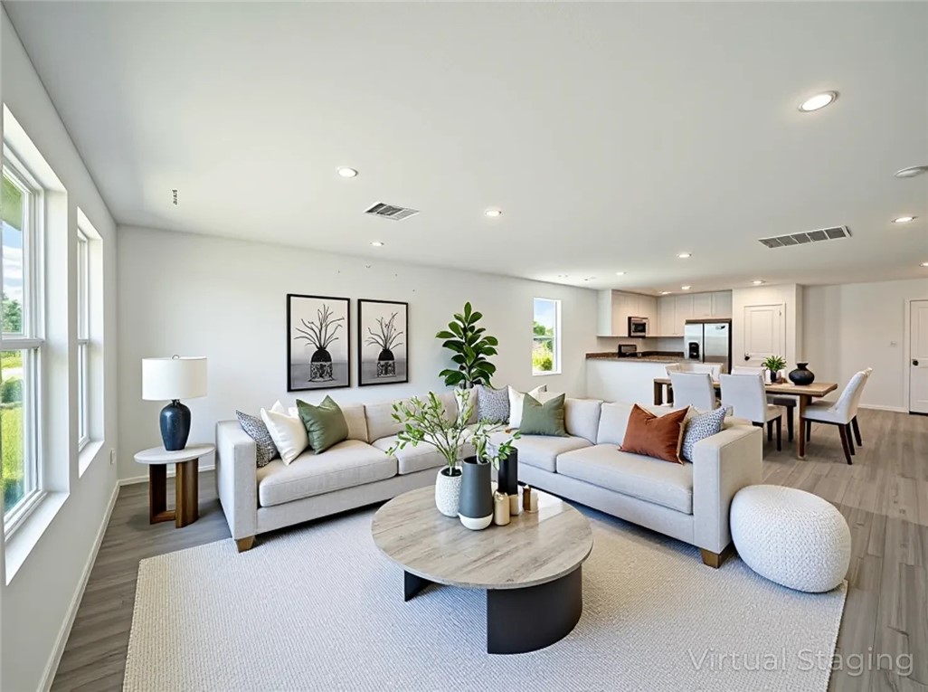 9201 Wilde Way Corpus Christi, TX 78410 - Photo 12 of 21 a living room with furniture potted plant and a large window