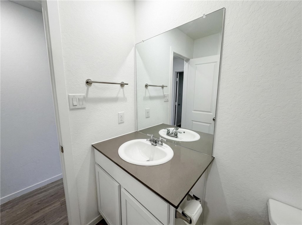 9201 Wilde Way Corpus Christi, TX 78410 - Photo 14 of 21 a bathroom with a sink and a mirror