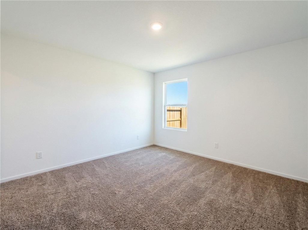 9201 Wilde Way Corpus Christi, TX 78410 - Photo 16 of 21 an empty room with a window
