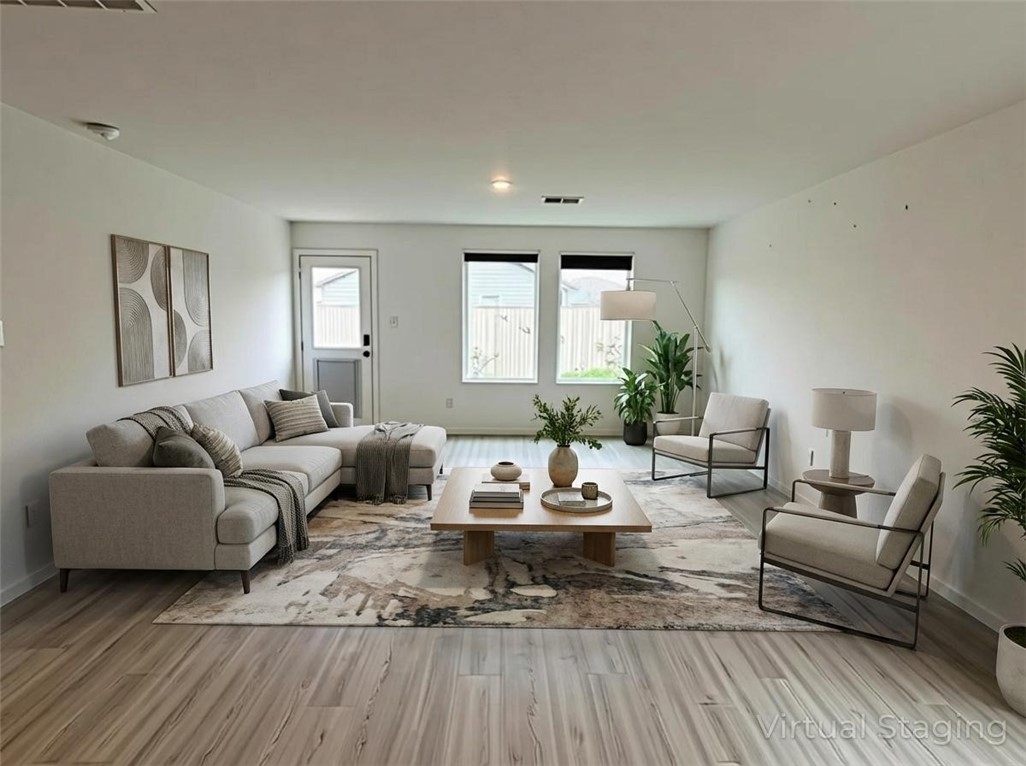 9201 Wilde Way Corpus Christi, TX 78410 - Photo 3 of 21 a living room with furniture and a wooden floor