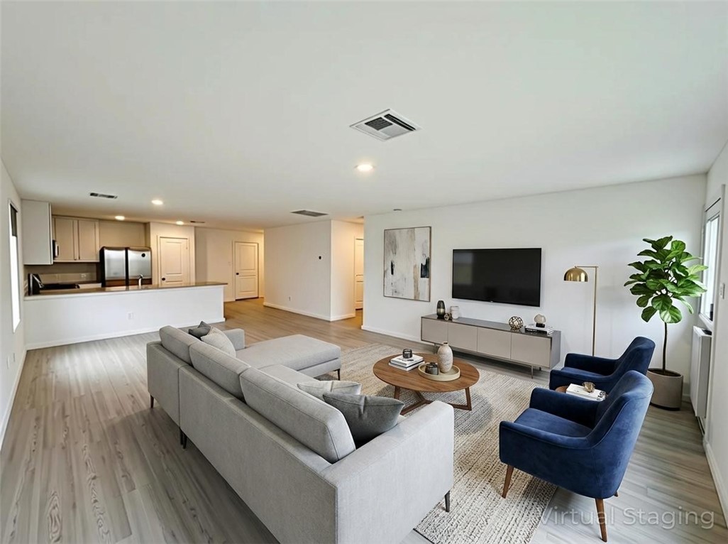 9201 Wilde Way Corpus Christi, TX 78410 - Photo 5 of 21 a living room with furniture and a flat screen tv