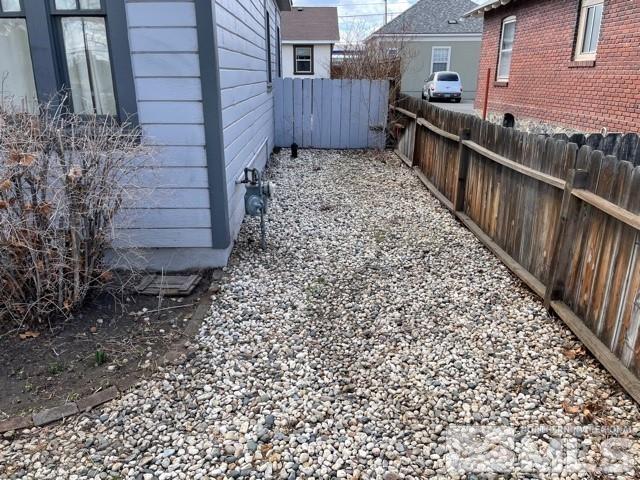 151 Vine Street Reno, NV 89503 - Photo 12 of 12 a view of a backyard with wooden fence