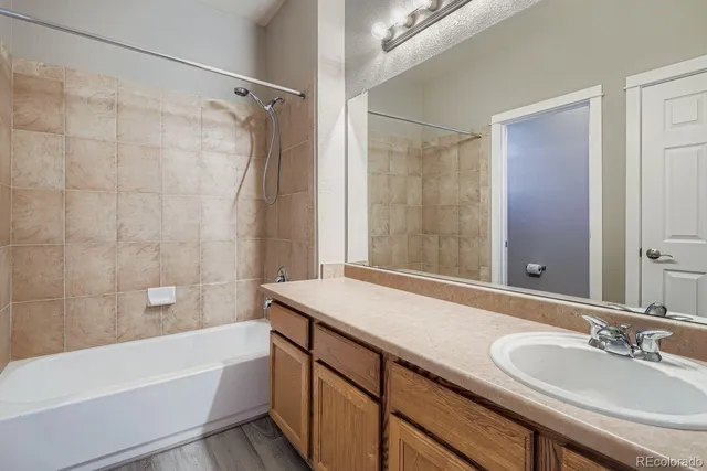 a bathroom with a sink and a bathtub