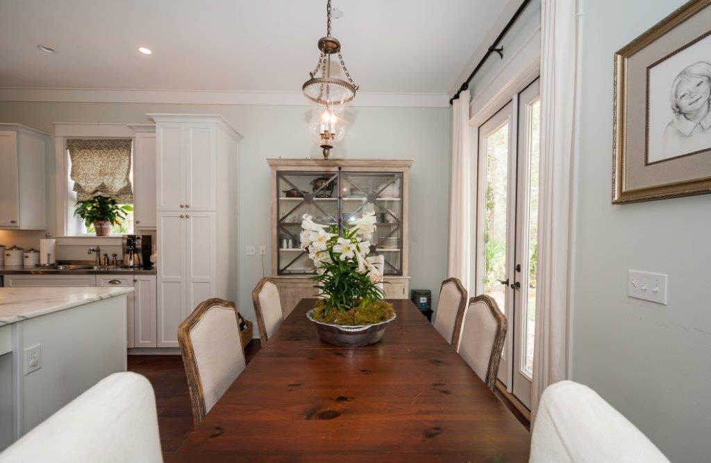 97 Spotted Dolphin Road Santa Rosa Beach, FL 32459 - Photo 12 of 32 a view of a dining room with furniture a chandelier and window