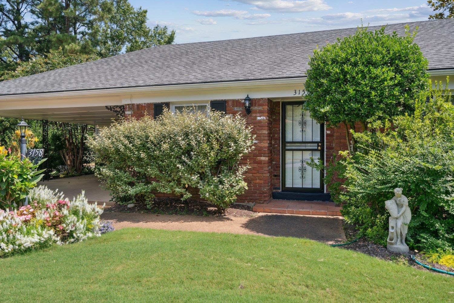 3158 Keats Road Memphis, TN 38134 - Photo 2 of 21 Doorway to property with a lawn