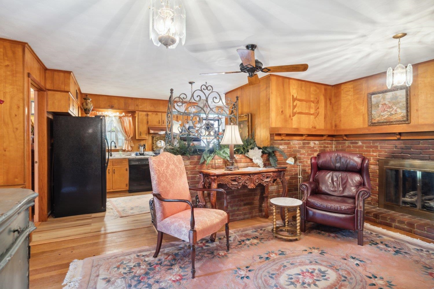 3158 Keats Road Memphis, TN 38134 - Photo 10 of 21 Living area featuring ceiling fan, light wood-type flooring, and a brick fireplace