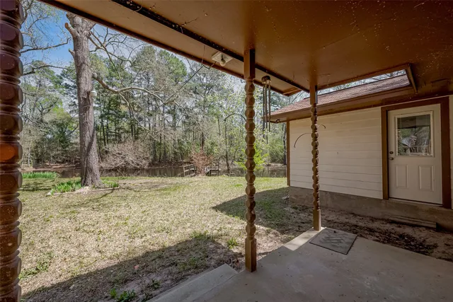 a backyard of a house with lots of green space