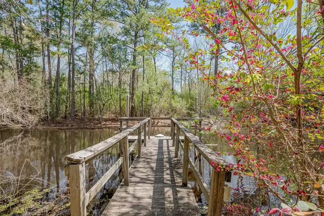 a view of lake from balcony with outdoor space