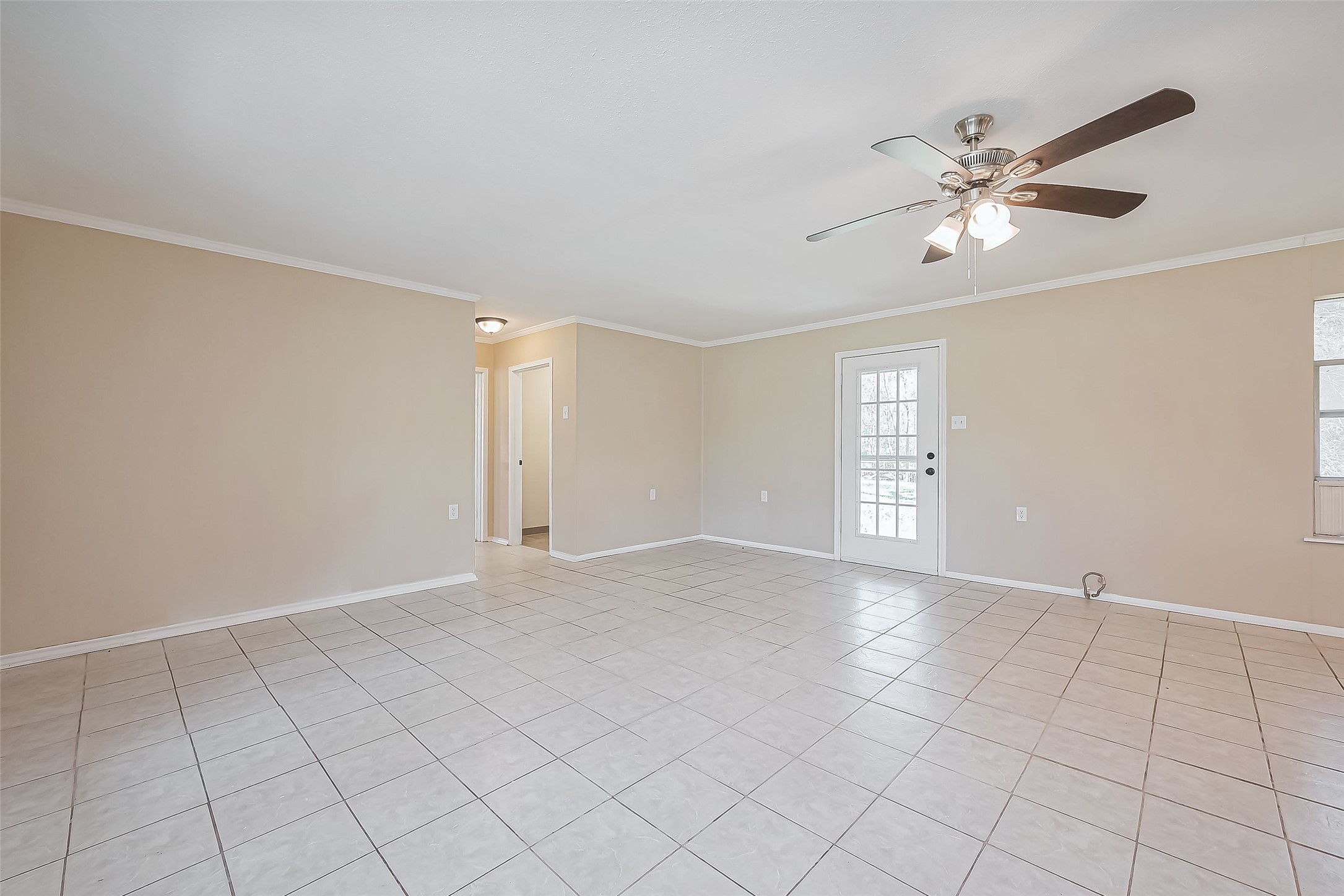 14 Veronica Lane Huntsville, TX 77340 - Photo 4 of 50 a view of an empty room with a window