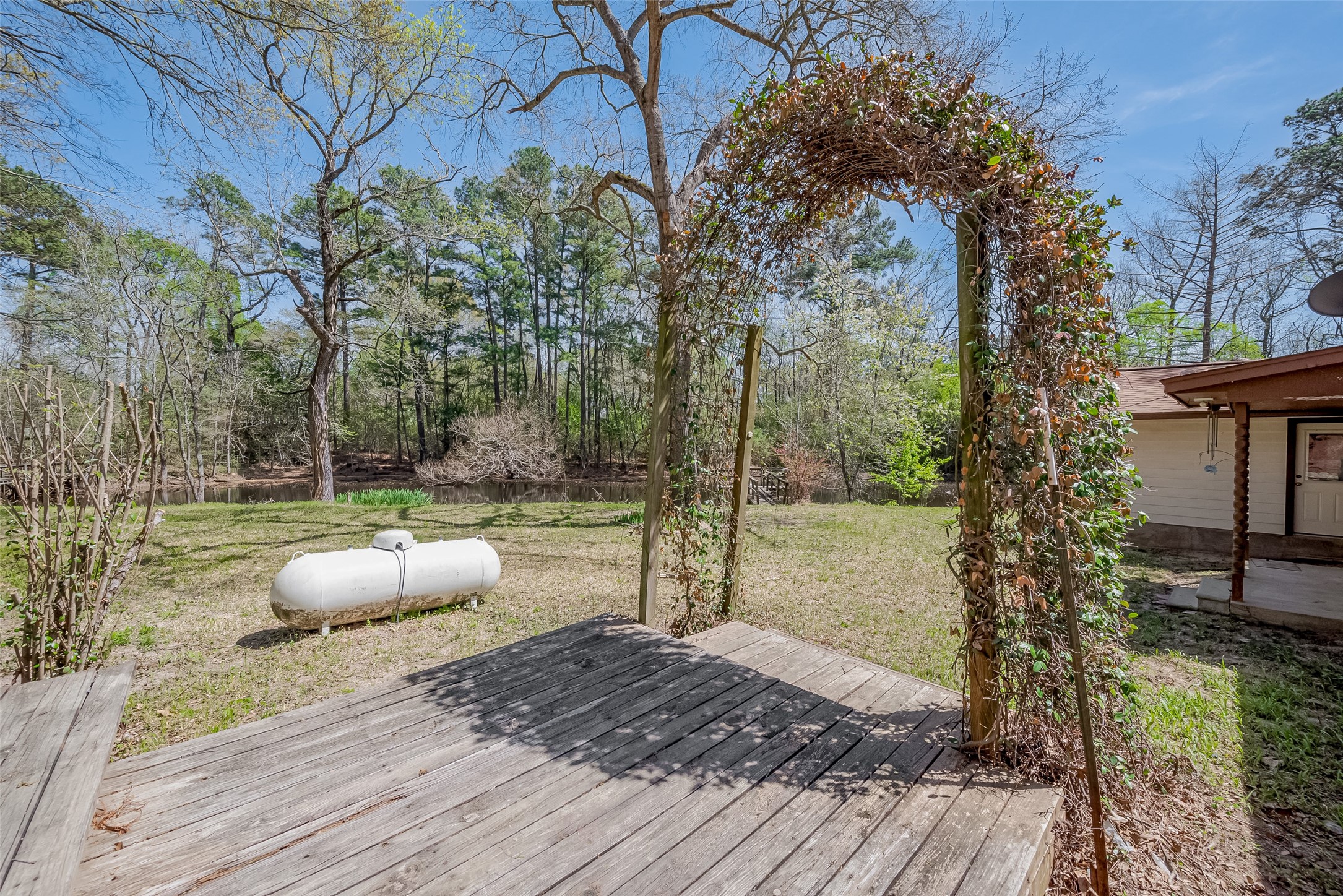 14 Veronica Lane Huntsville, TX 77340 - Photo 48 of 50 a view of a backyard with sitting area