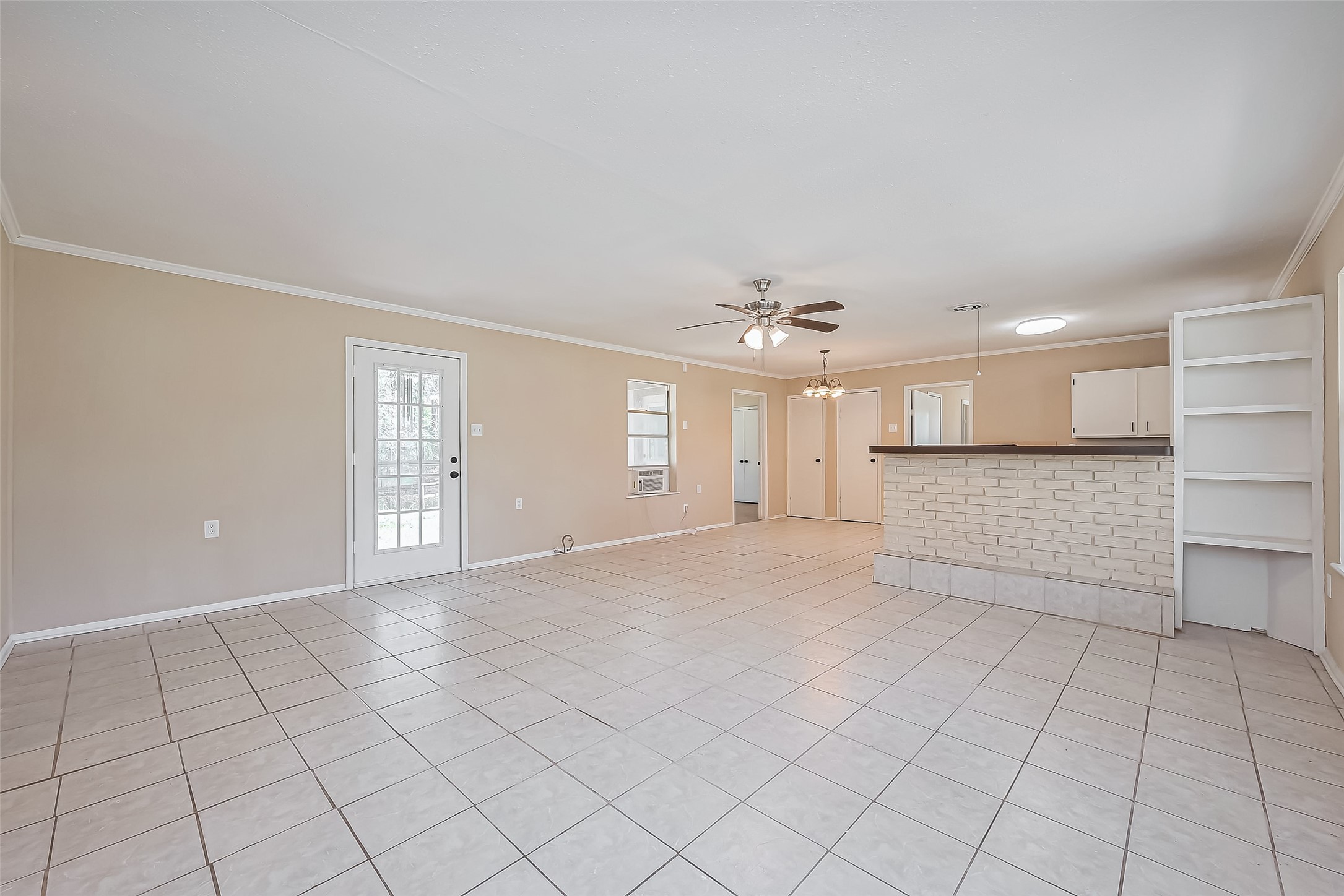14 Veronica Lane Huntsville, TX 77340 - Photo 5 of 50 a view of an empty room with a window