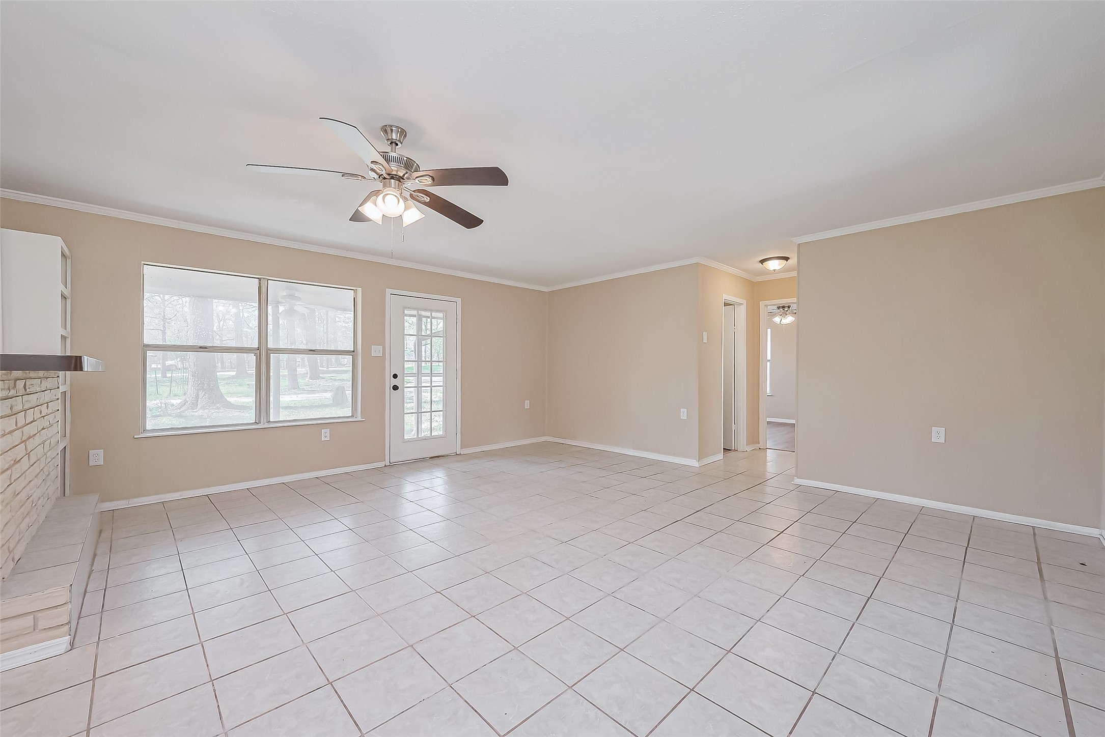 14 Veronica Lane Huntsville, TX 77340 - Photo 6 of 50 wooden floor in an empty room with a window