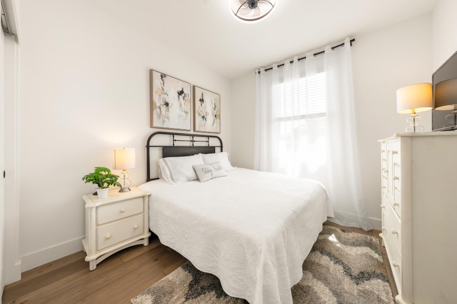 4216 Creede Way Rancho Cordova, CA 95742 - Photo 35 of 56 a bedroom with a bed and a window