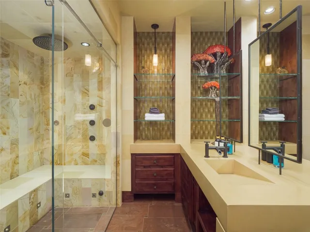 a view of a city with mountains in the background