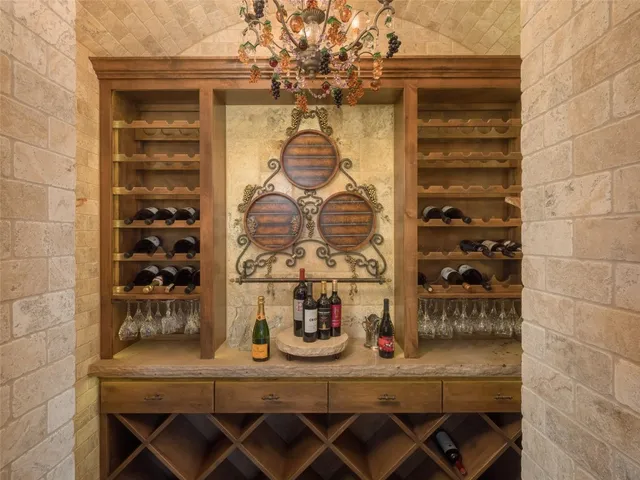 a kitchen with a table and chairs in it