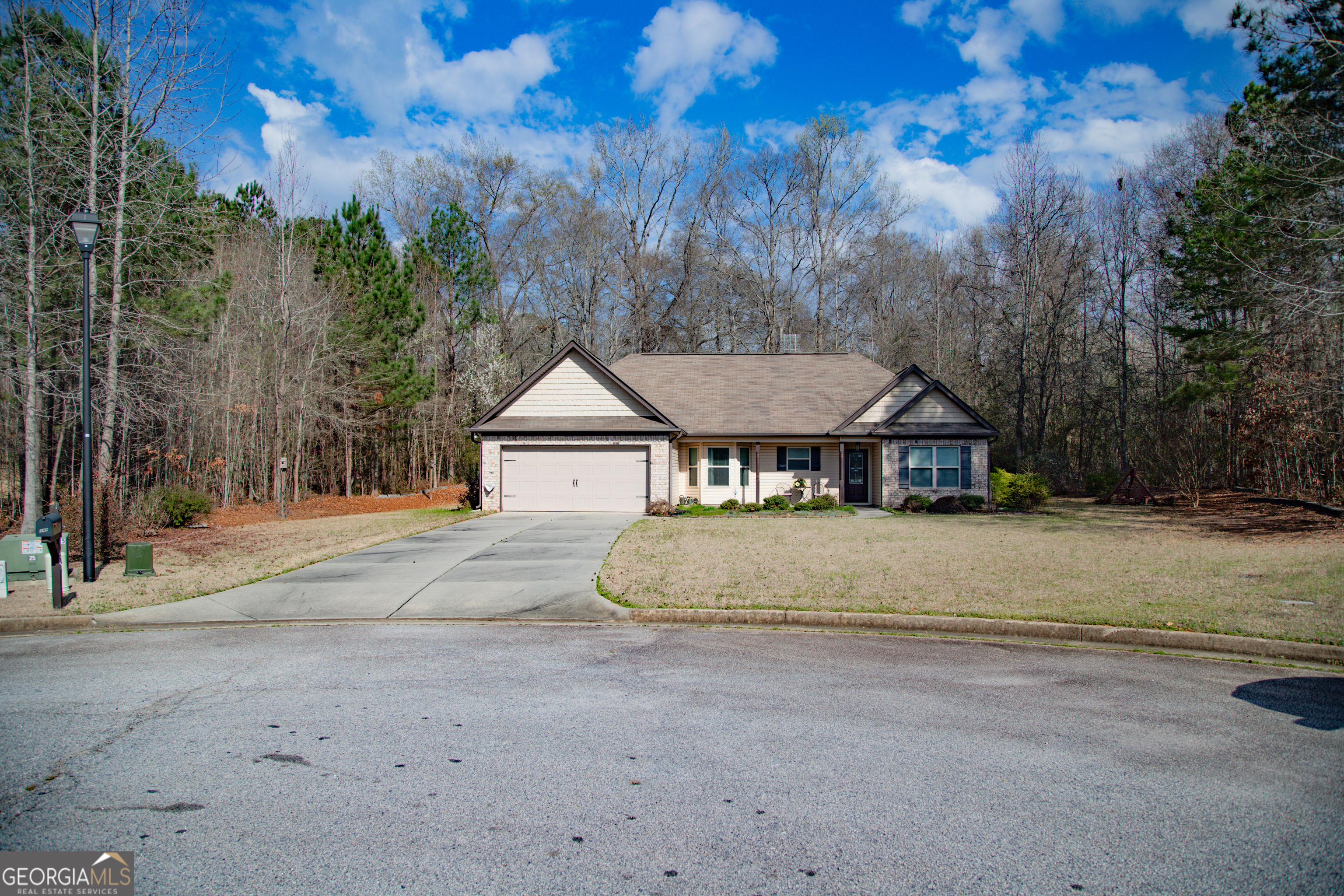 149 Bridle Path Griffin, GA 30224 - Photo 2 of 47 a front view of a house with a yard