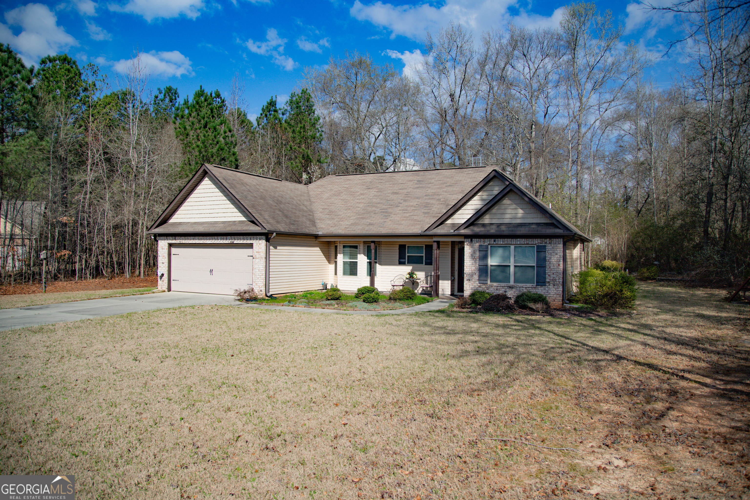 149 Bridle Path Griffin, GA 30224 - Photo 3 of 47 a view of a house with a yard