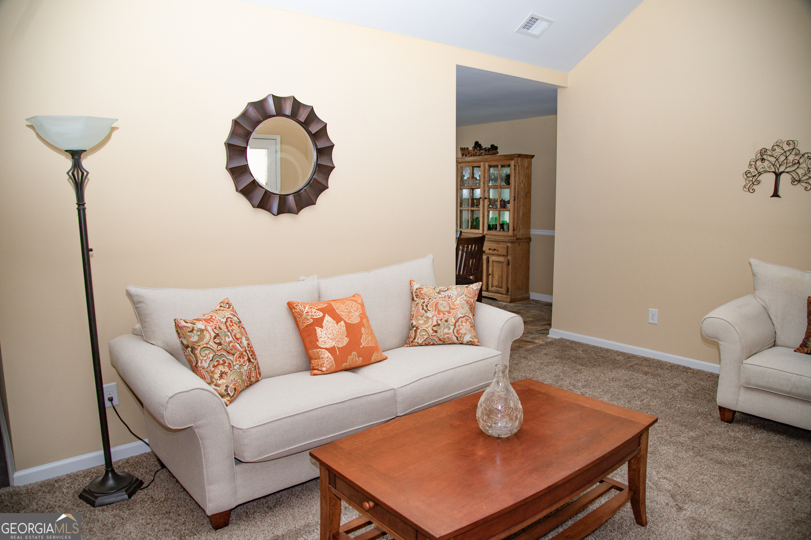 149 Bridle Path Griffin, GA 30224 - Photo 9 of 47 a living room with furniture and a wooden floor