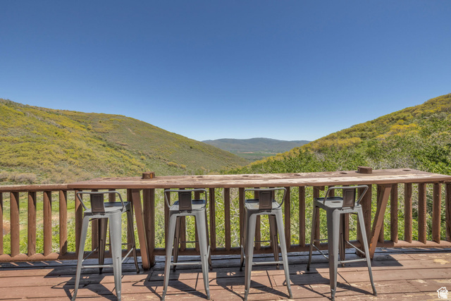 2348 North Miles Holw Road, Unit 26 Kamas, UT 84036 - Photo 23 of 31 Wooden terrace featuring a mountain view