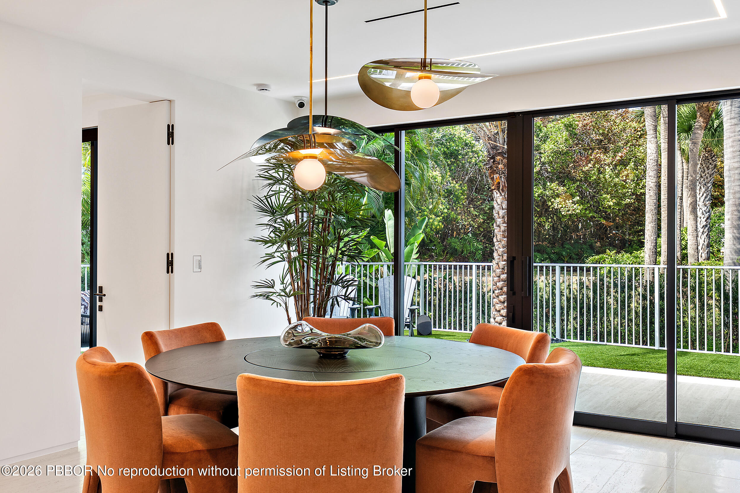 3501 Captains Way, Unit 3501 Jupiter, FL 33477 - Photo 14 of 41 a view of a dining room with furniture window and outside view
