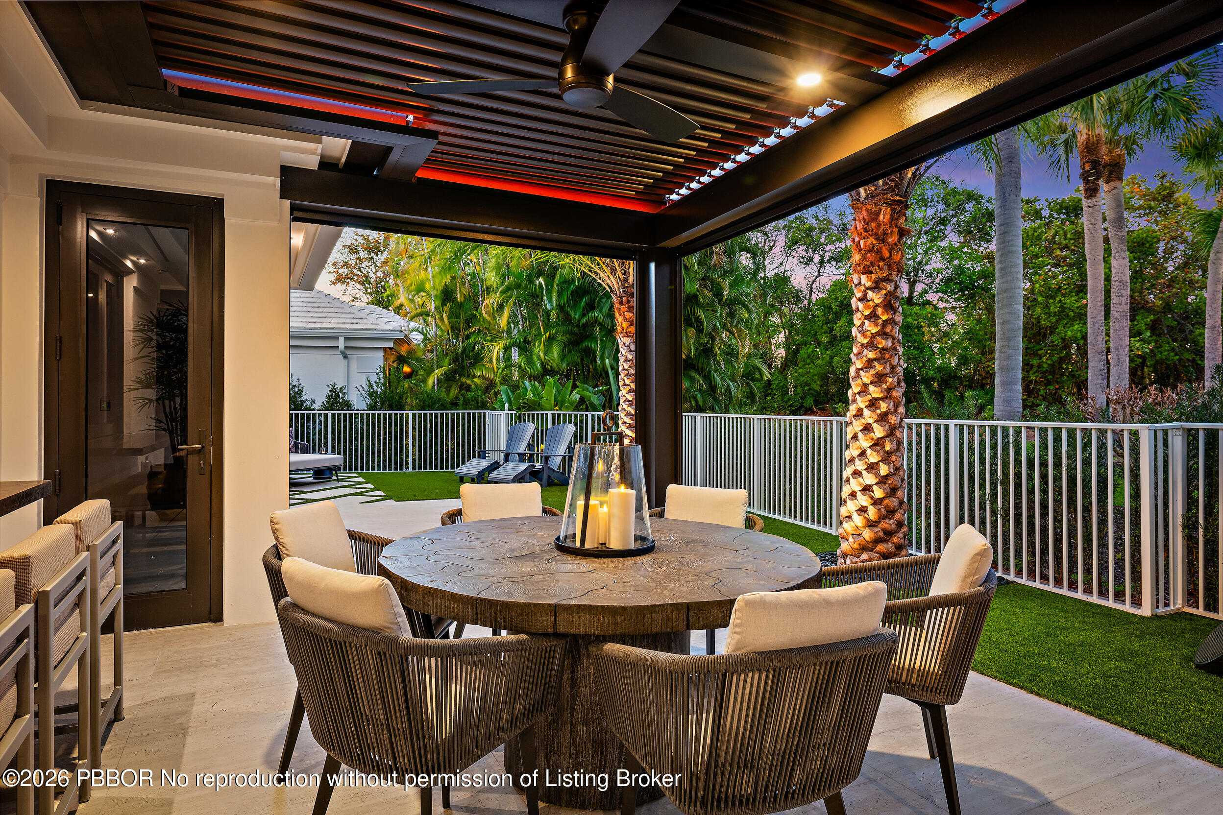 3501 Captains Way, Unit 3501 Jupiter, FL 33477 - Photo 2 of 41 a view of backyard with dining space and garden