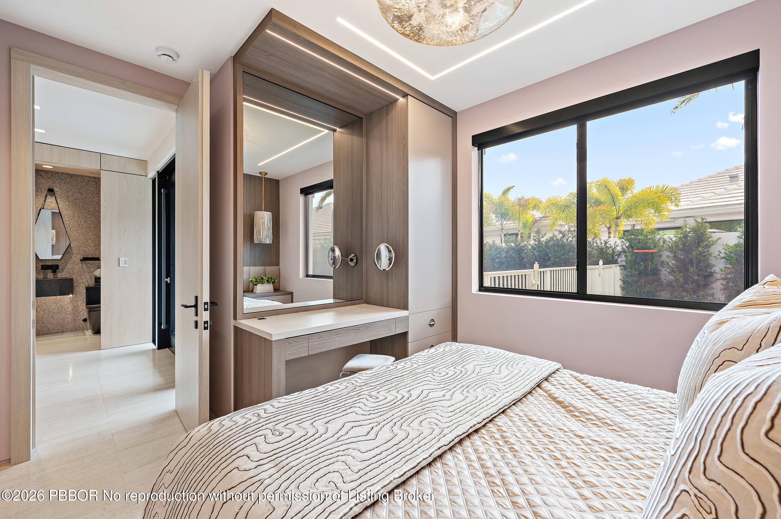 3501 Captains Way, Unit 3501 Jupiter, FL 33477 - Photo 21 of 41 a bedroom with a large bed and a large window