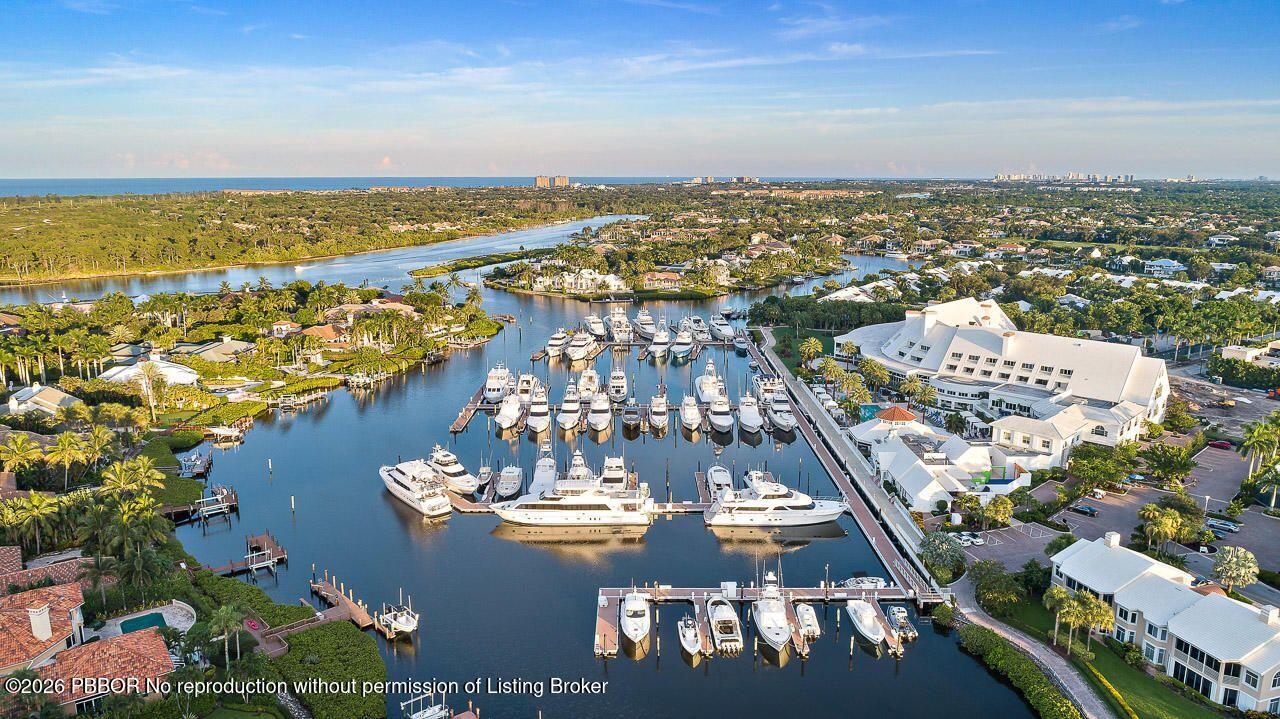 3501 Captains Way, Unit 3501 Jupiter, FL 33477 - Photo 24 of 41 an aerial view of residential building with outdoor space