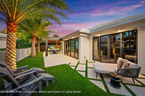 a view of a backyard of the house