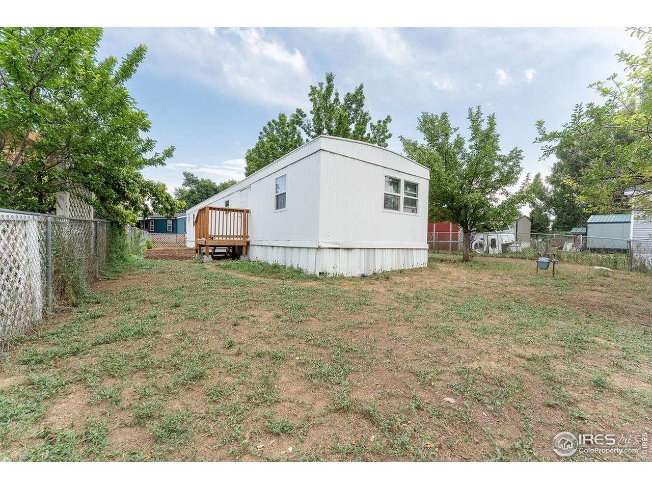 2500 East Harmony Road, Unit 456 Fort Collins, CO 80528 - Photo 19 of 22 a house view with a garden space
