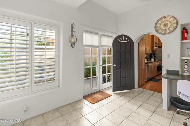 a bathroom with a double vanity sink mirror and shower