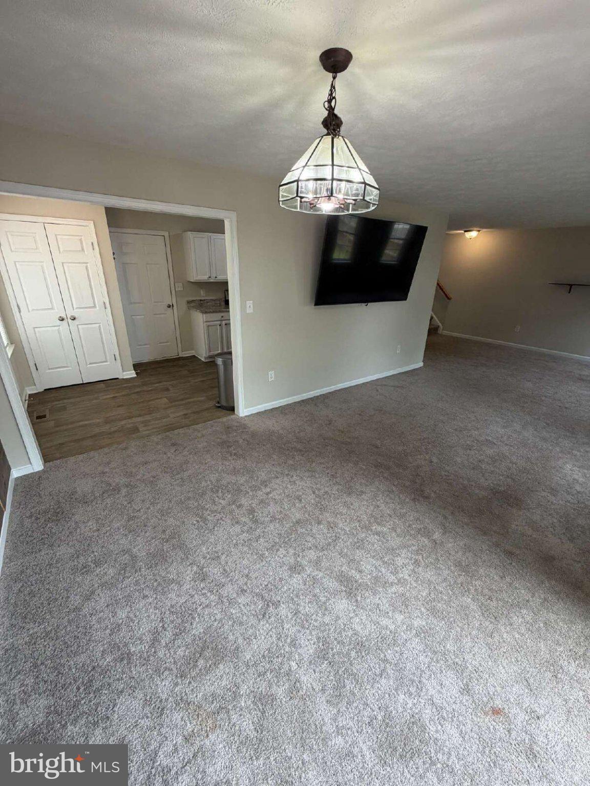 313 3rd Street Colonial Beach, VA 22443 - Photo 3 of 36 Spacious living area with modern charm.