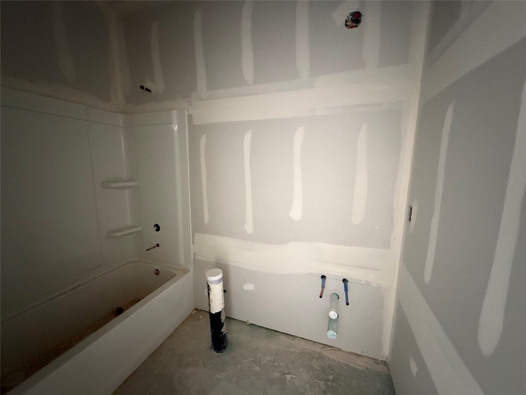 1000 Sethi Road Georgetown, TX 78633 - Photo 6 of 24 a bathroom with a bathtub and shower