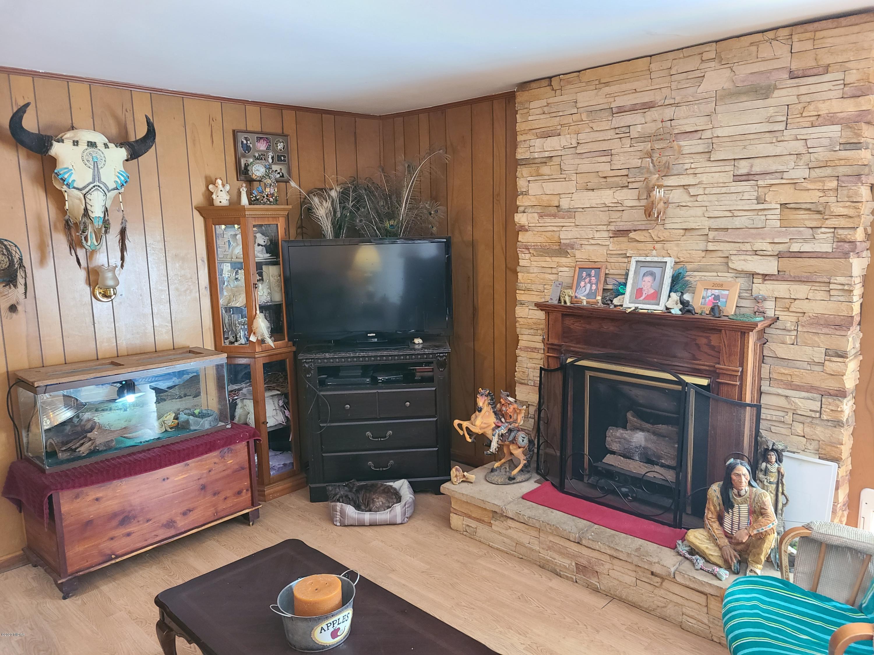 1172 Cumslo Road Macon, GA 31211 - Photo 26 of 33 a living room with furniture and a fireplace