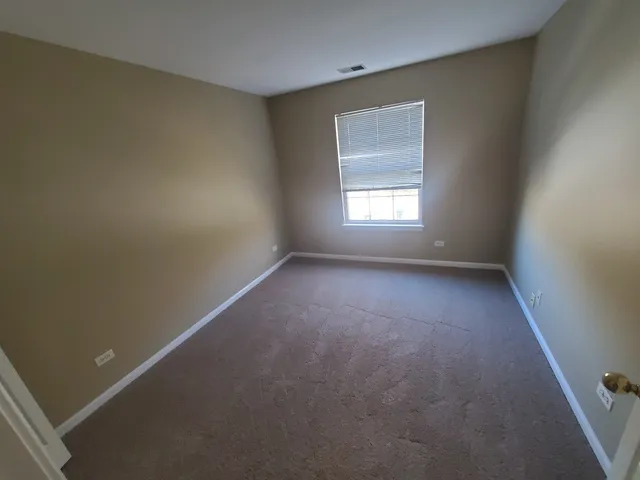 $192,500 | 1037 North Village Drive, Unit 3, Round Lake Beach, IL 60073