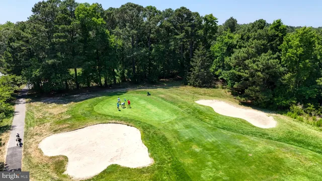 a view of swimming pool with a garden