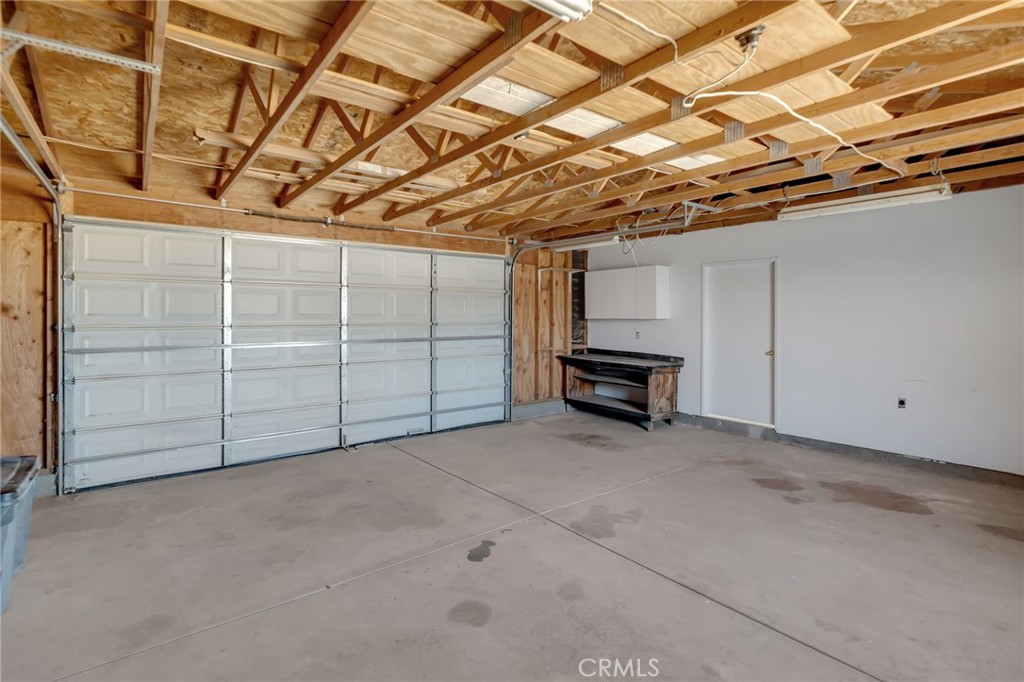 12736 Oasis Road Pinon Hills, CA 92372 - Photo 21 of 33 a view of a garage room