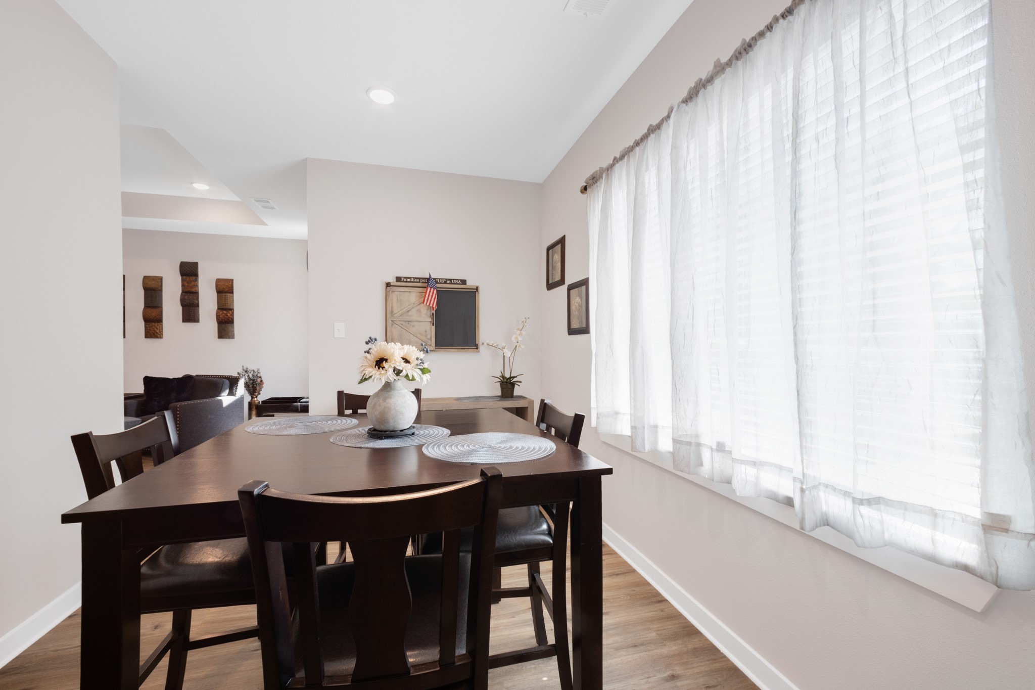 10317 Lake Road, Unit 9A Houston, TX 77070 - Photo 7 of 19 a view of a dining room with furniture and window