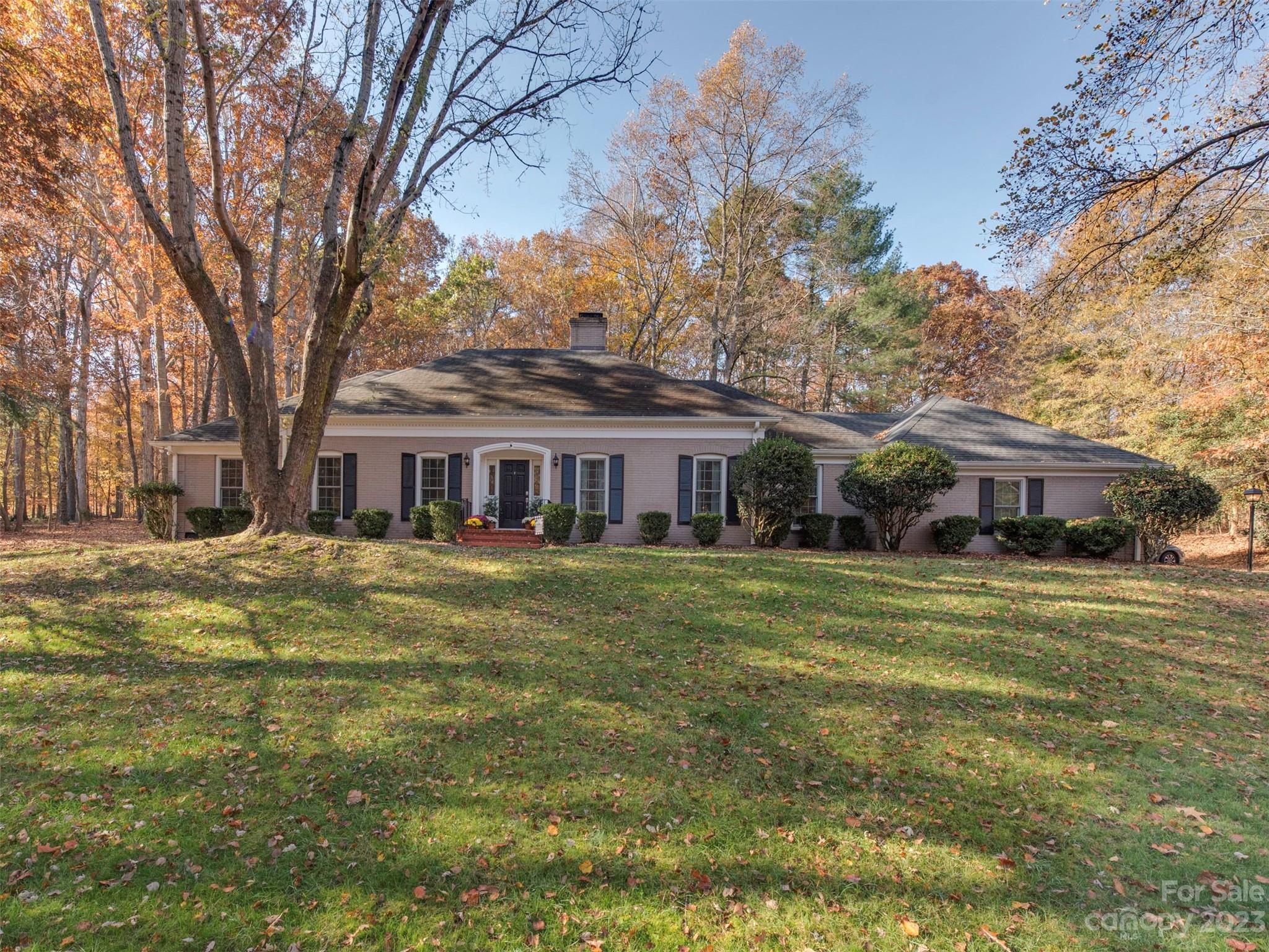 3101 High Ridge Road Charlotte, NC 28270 - Photo 1 of 45 a front view of a house with a garden