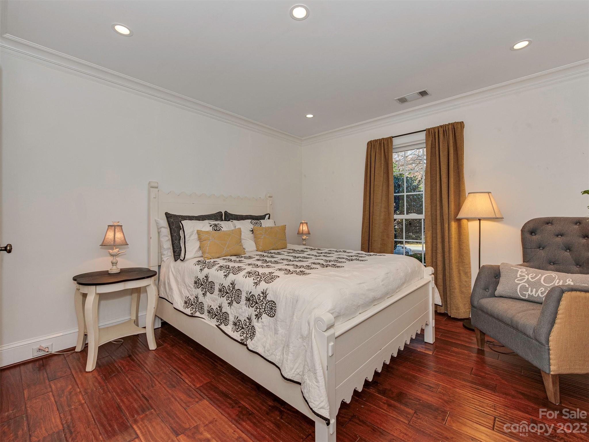 3101 High Ridge Road Charlotte, NC 28270 - Photo 15 of 45 a bedroom with a bed and wooden floor