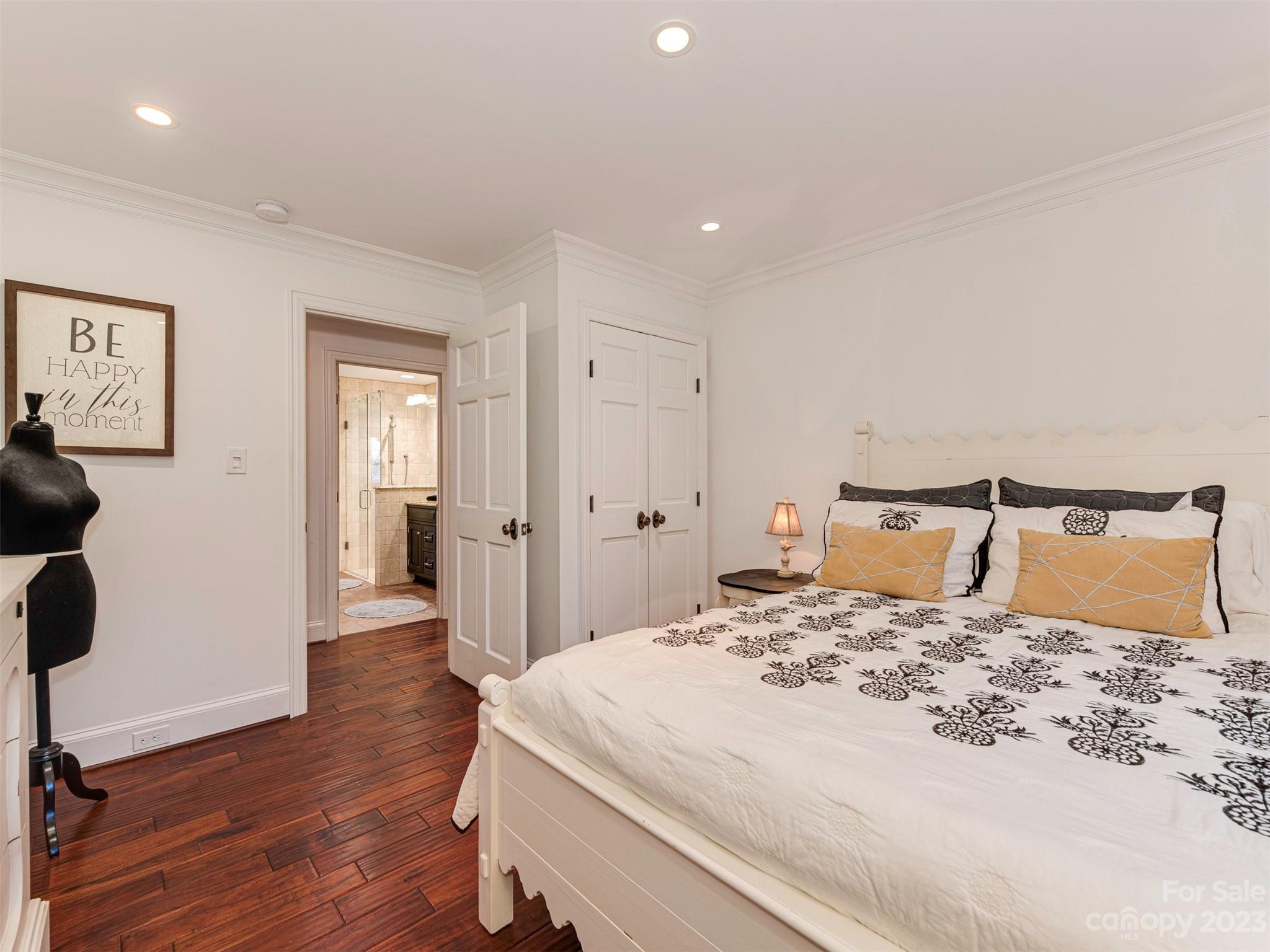 3101 High Ridge Road Charlotte, NC 28270 - Photo 16 of 45 a bedroom with a large bed and wooden floor