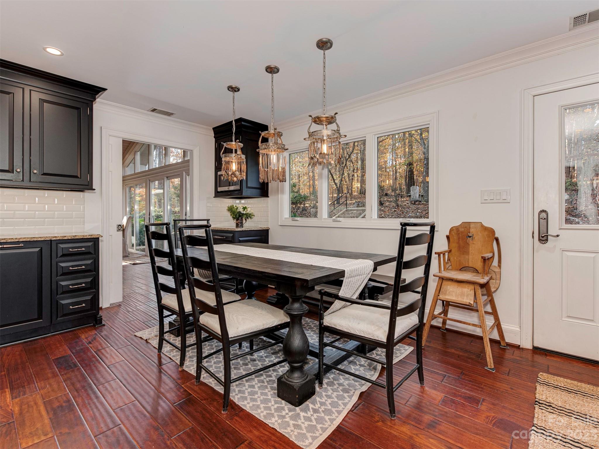 3101 High Ridge Road Charlotte, NC 28270 - Photo 10 of 45 a view of a dining room with furniture window and wooden floor